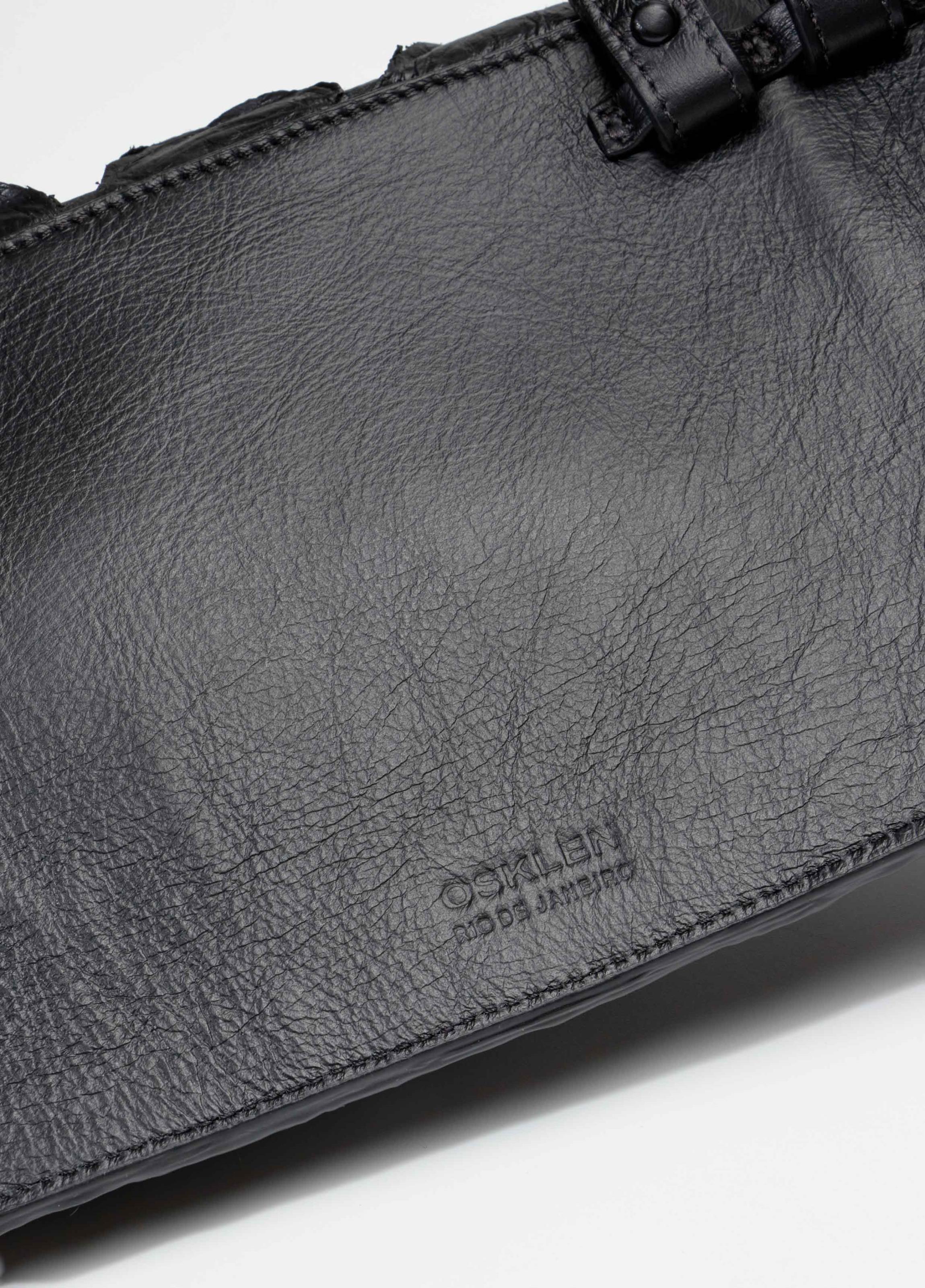 Bolsa pirarucu taparaue tachas