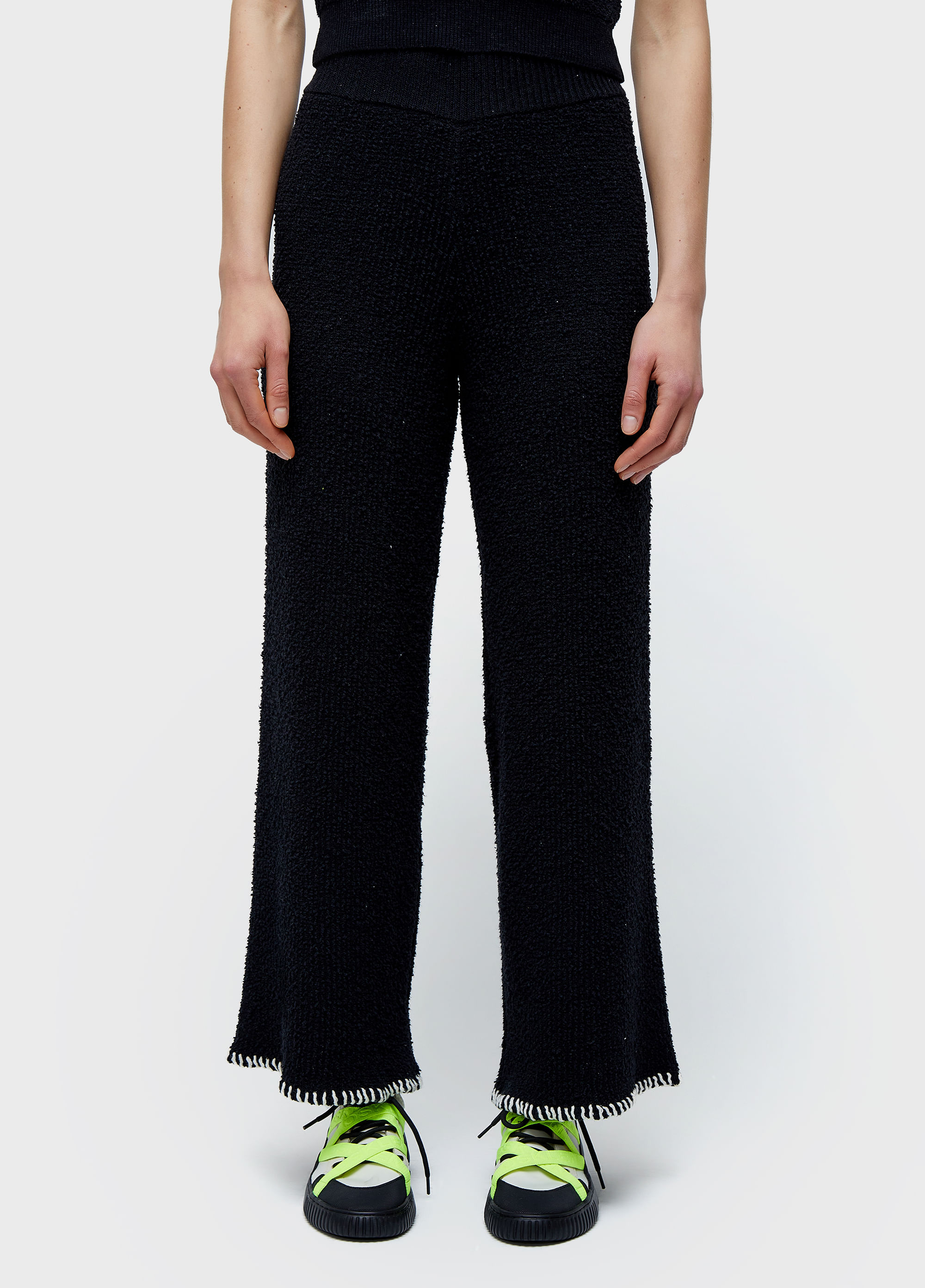 Calça  tricot pespontos
