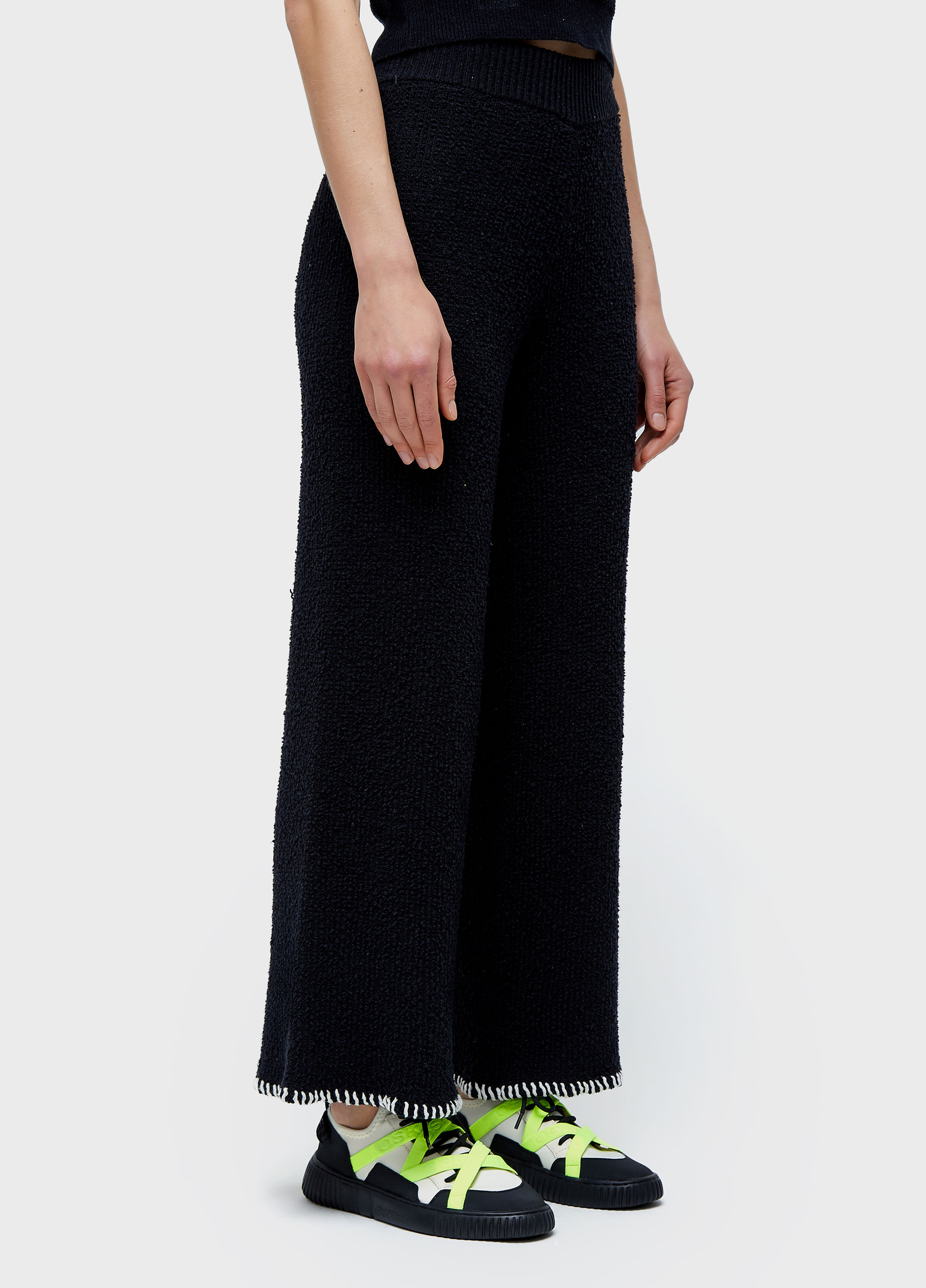 Calça tricot pespontos
