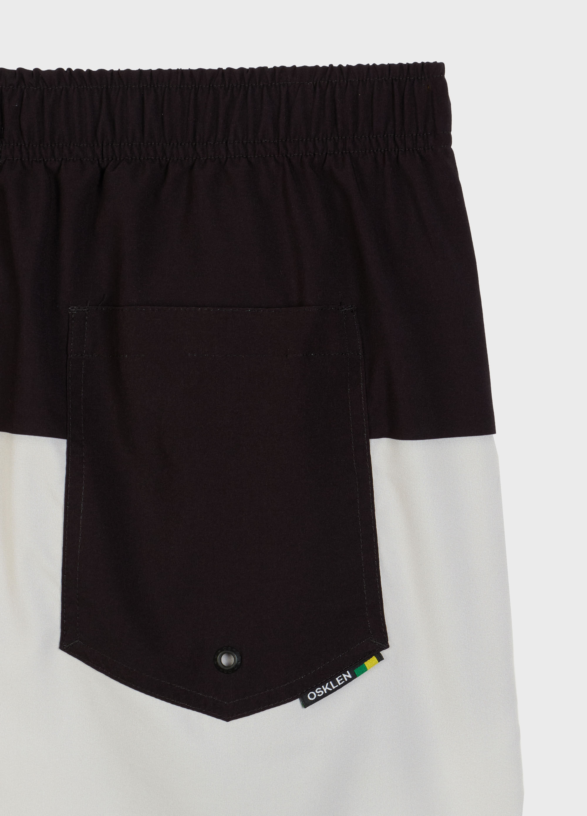 Beach short bicolor brasão