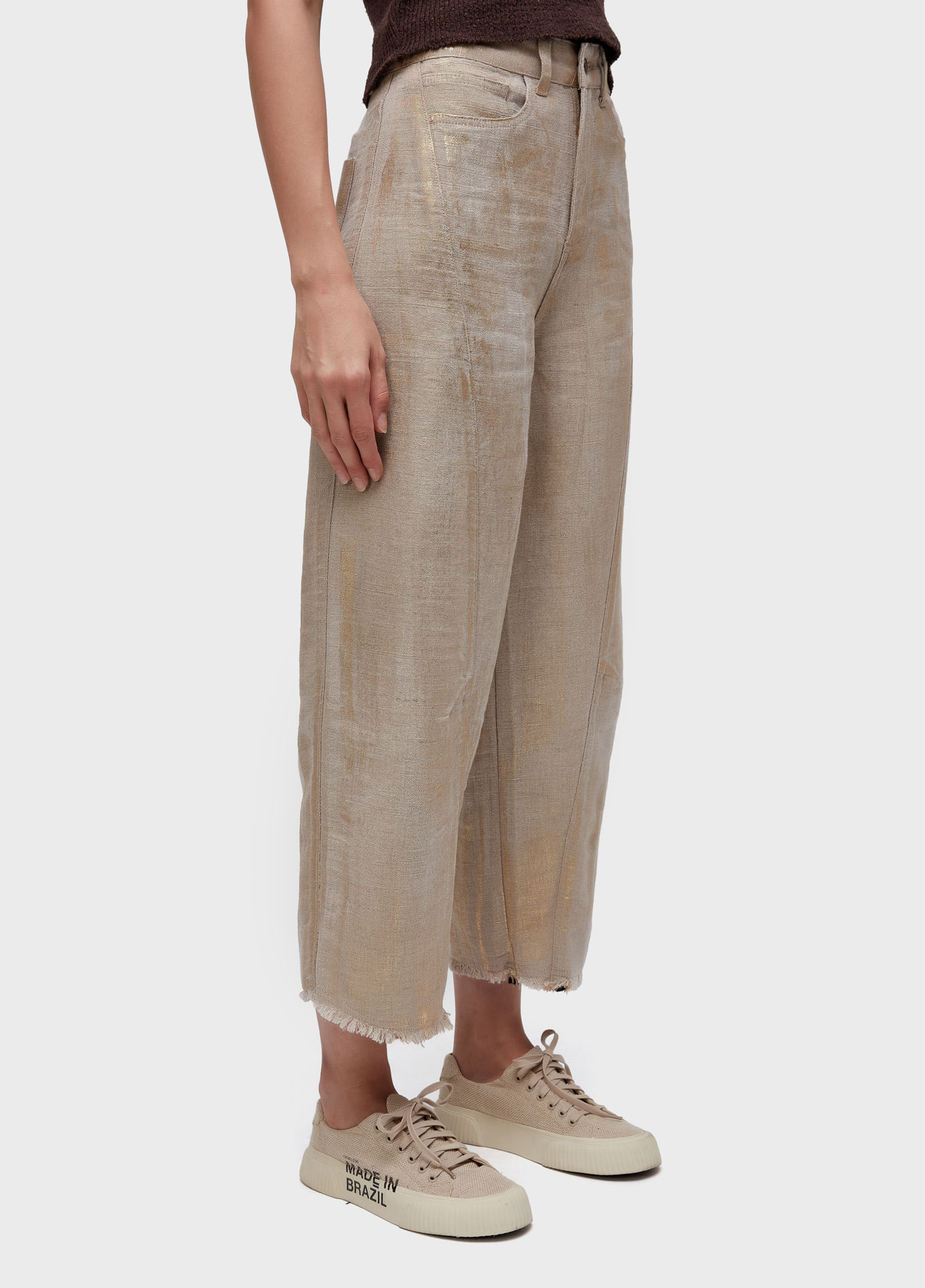 Calça recortes juta gold