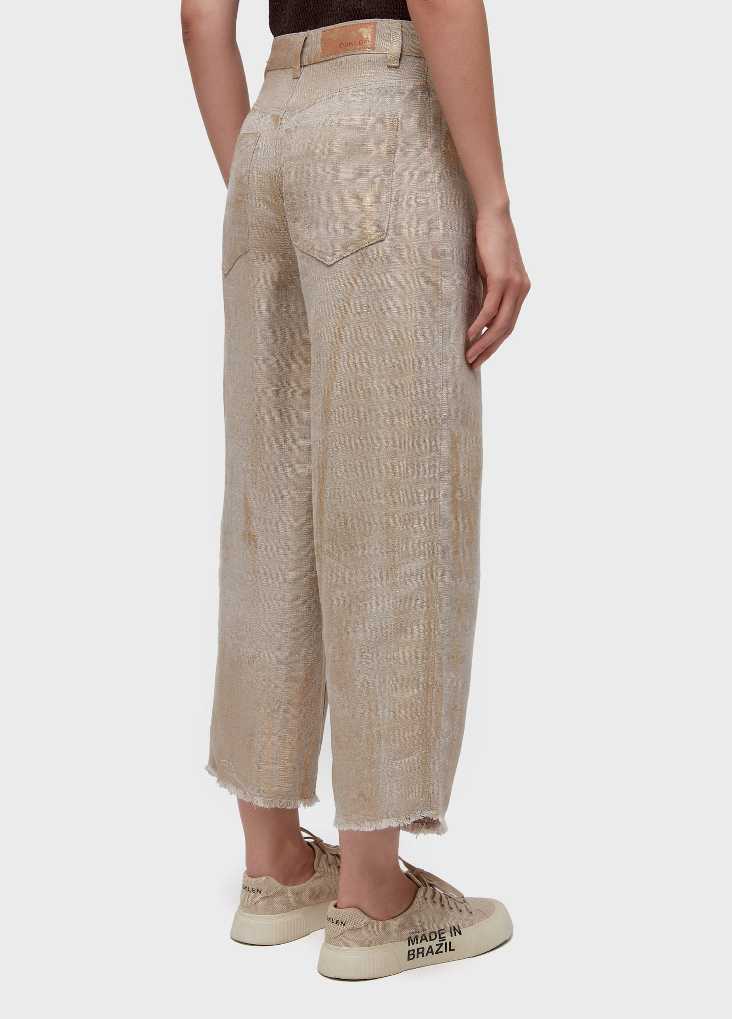 Calça recortes juta gold