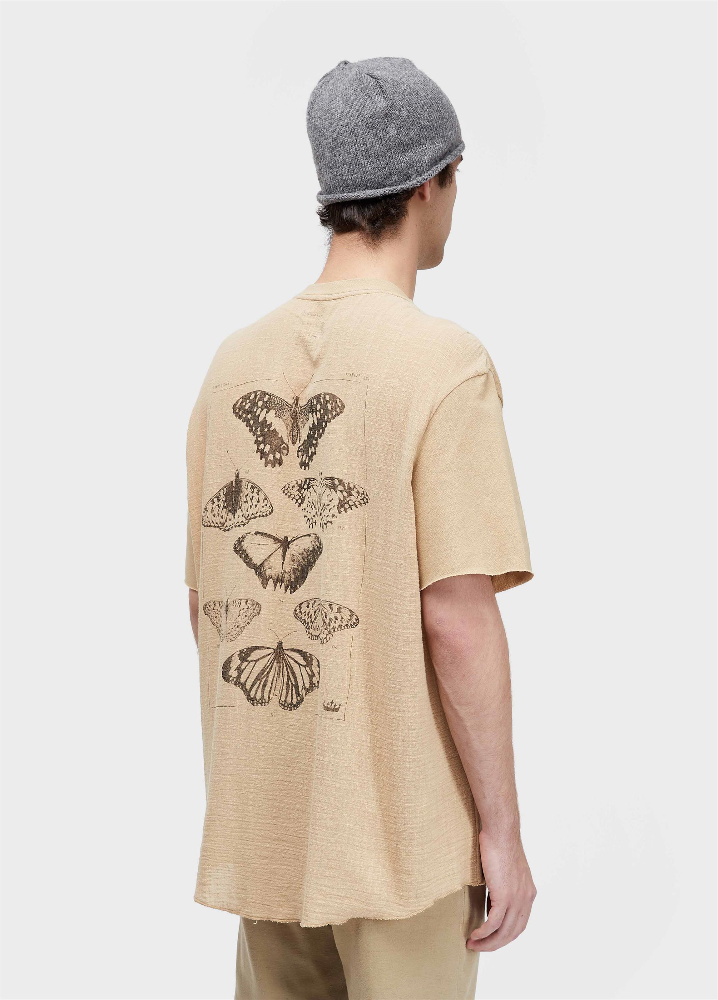 T-shirt over rustic butterfly