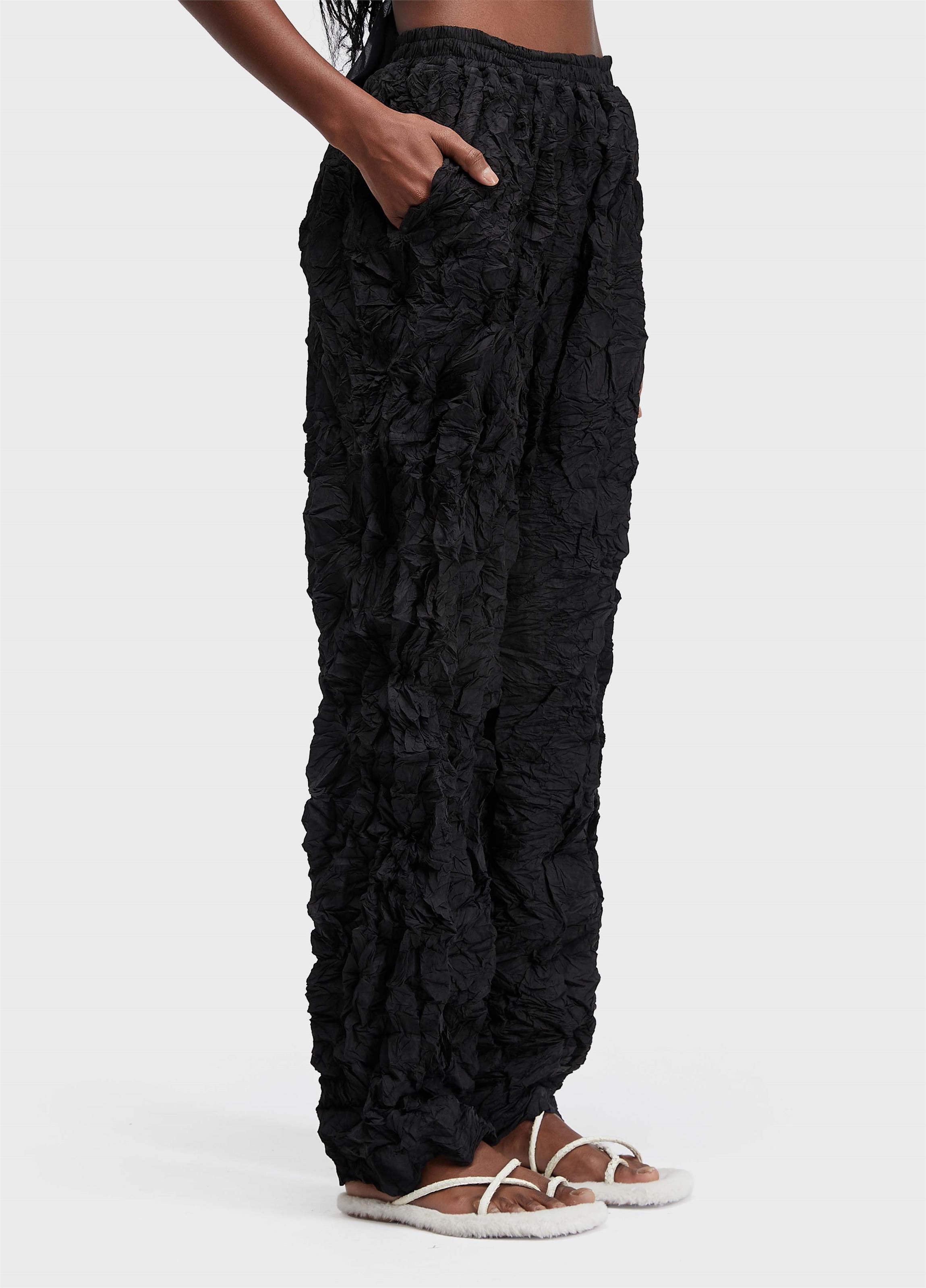 Calça plisse texture